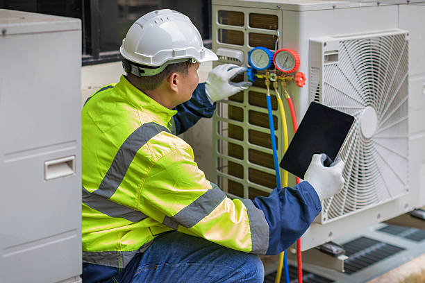 Professional Hvac technician working in Manchester, MA